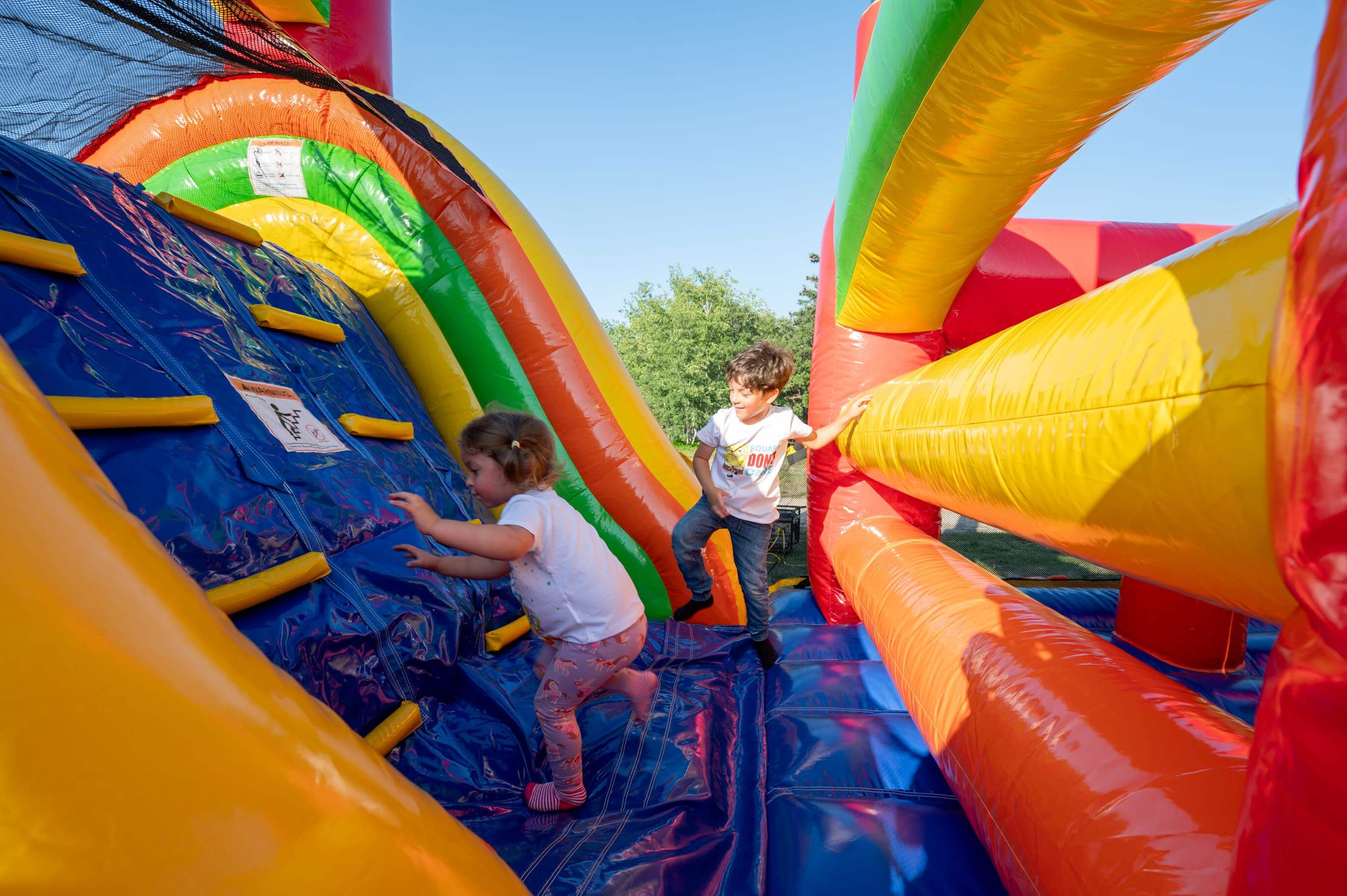 60' Rainbow Titan Obstacle Course Bouncy Castle party rentals Ottawa Ontario and Gatineau Quebec