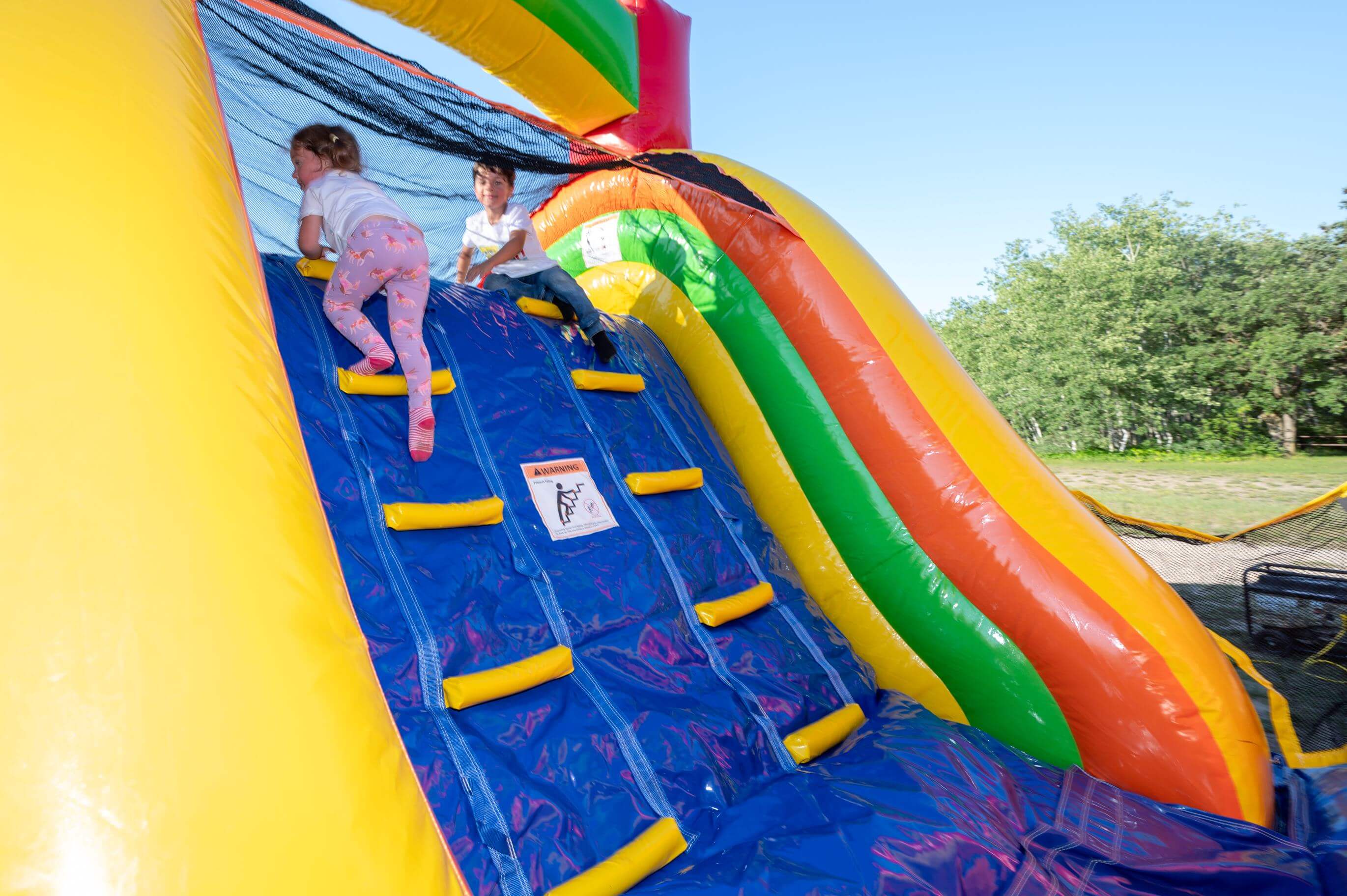 60' Rainbow Titan Obstacle Course Bouncy Castle party rentals Ottawa Ontario and Gatineau Quebec