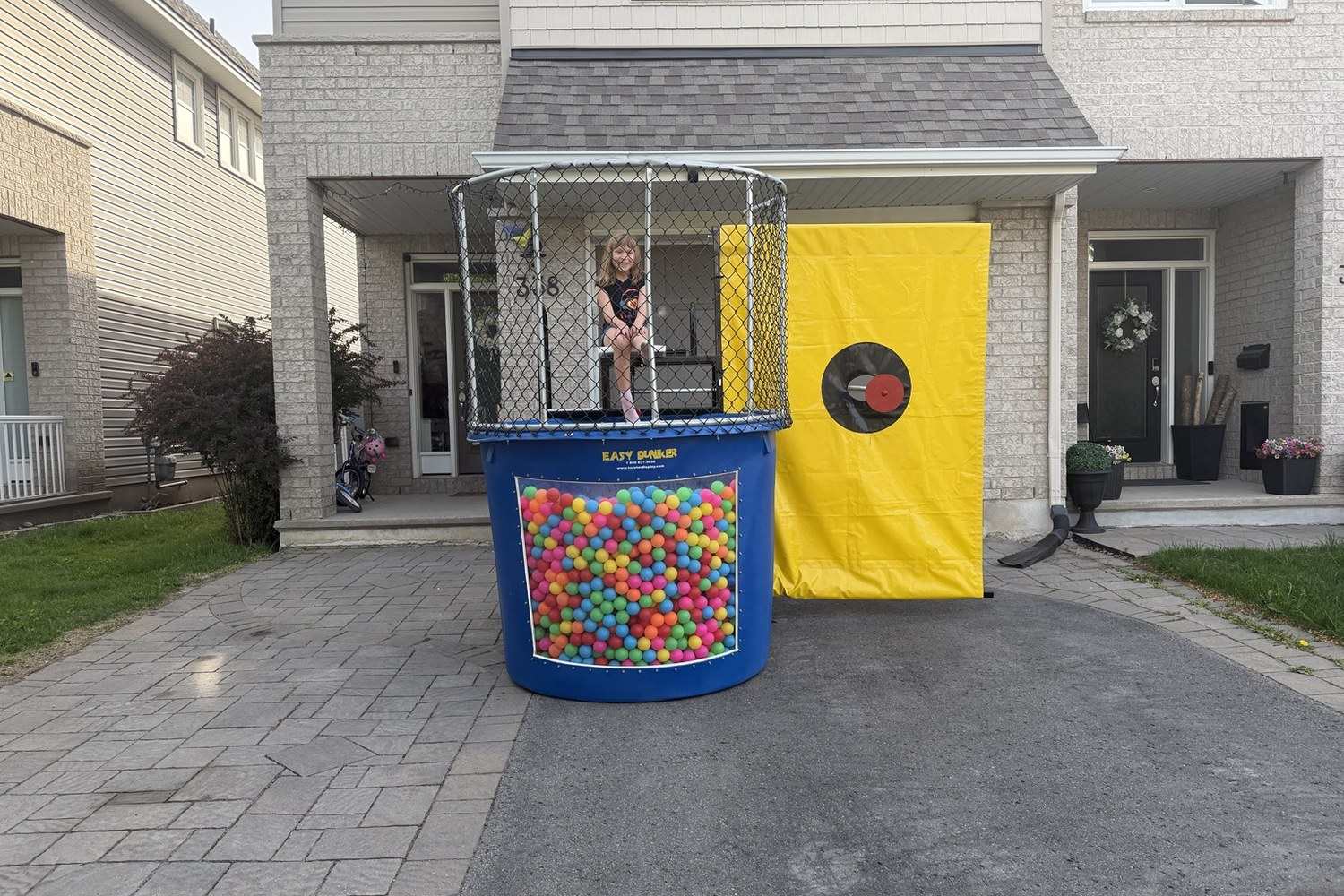 Any-weather dry dunk tank game with pit balls for kids teens and adults in Ottawa